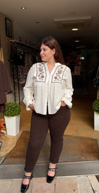 Jeans marron à pois